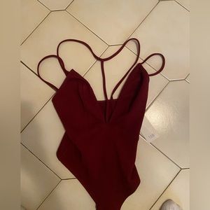 Maroon leo never worn
